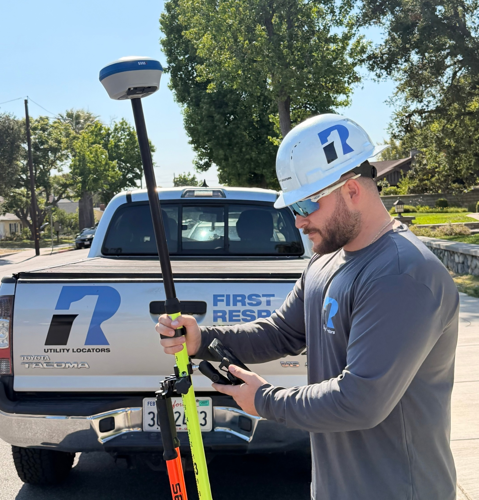 Utility locating technician on-site with GPR equipment